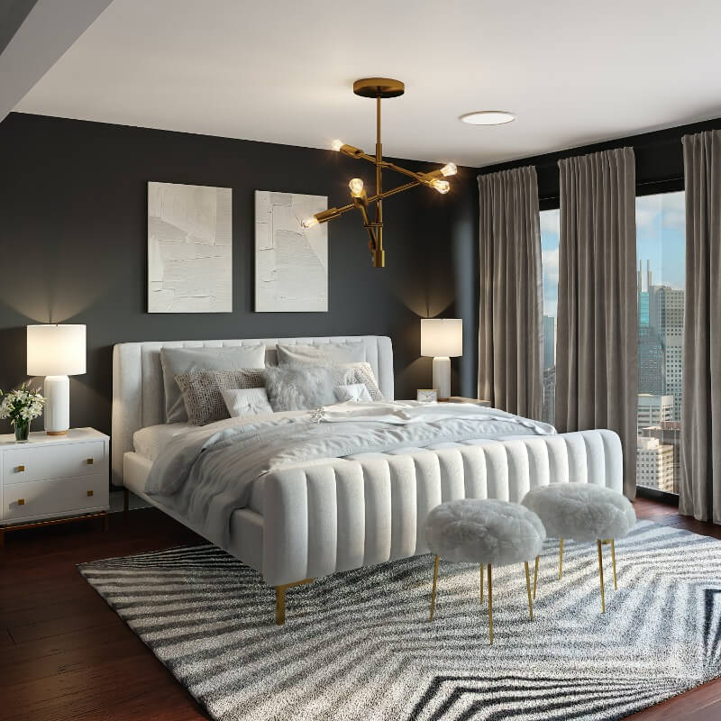 greyscale bedroom with fluffy footstools