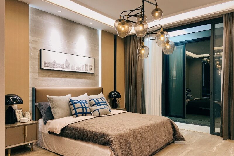 warm tone master bedroom with contemporary brass ceiling lamp