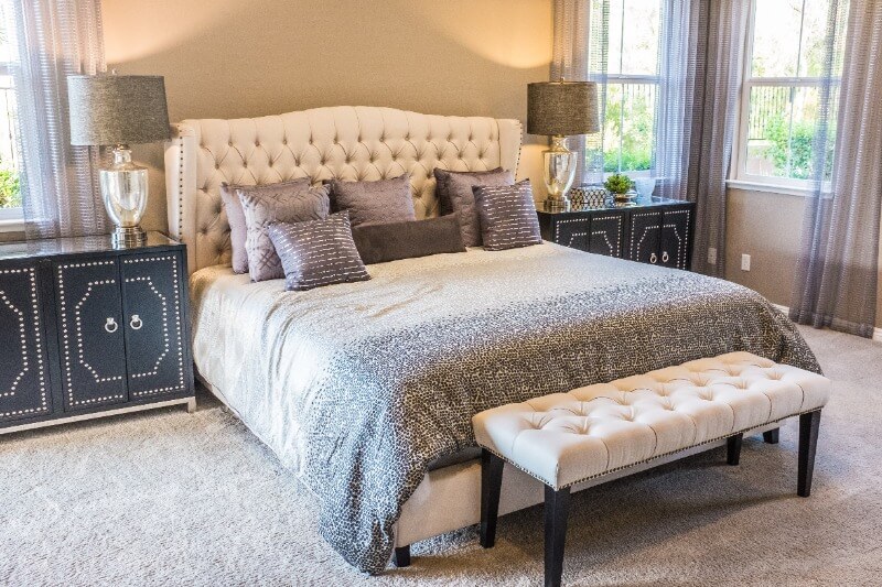big bed with grey comforters