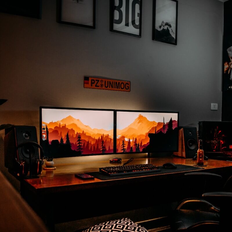 dark room with two monitors