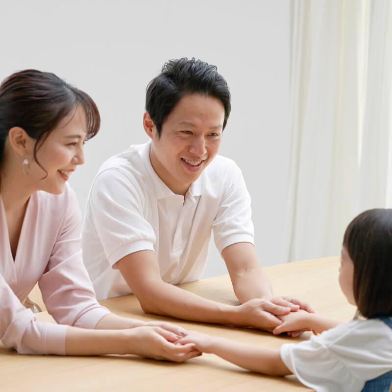 Parents talking to their daughter