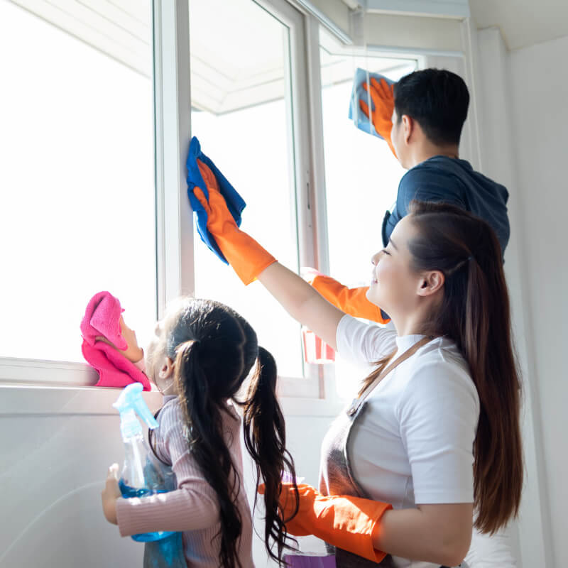 A family doing cleaning chores