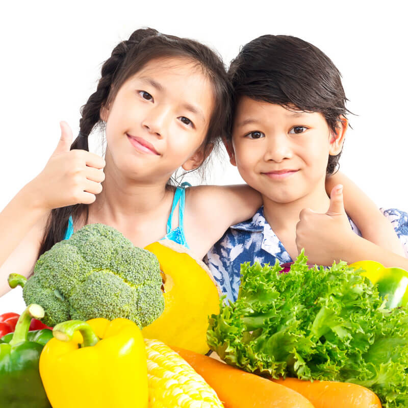 Kids with vegetables