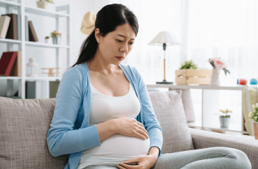 anxiety during pregnancy woman on couch