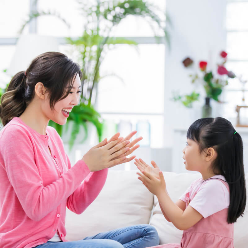 A mum playing with her daughter