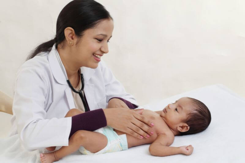 doctor-checking-newborn