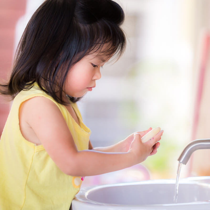 a girl hand washing