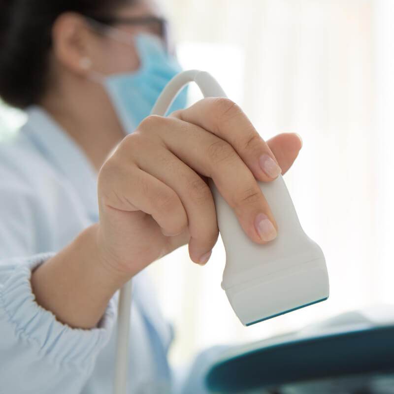 Doctor performing ultrasound