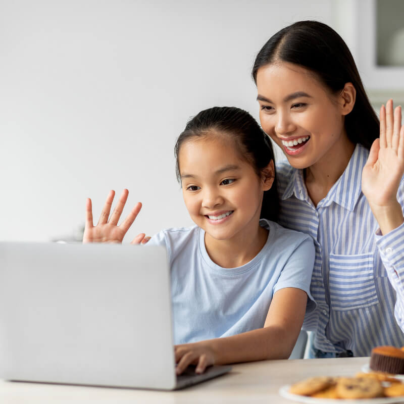 a mom and girl on video call