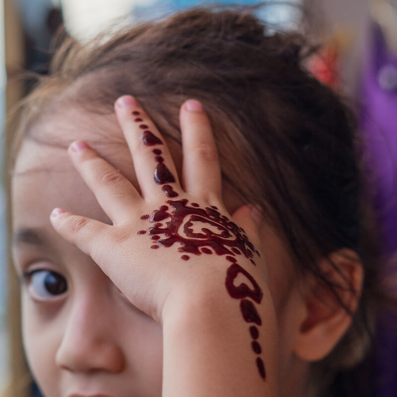 a girl shown henna