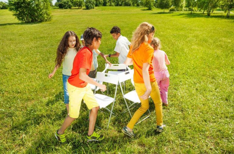 Children playing fun and educational circle games for kids in a group setting