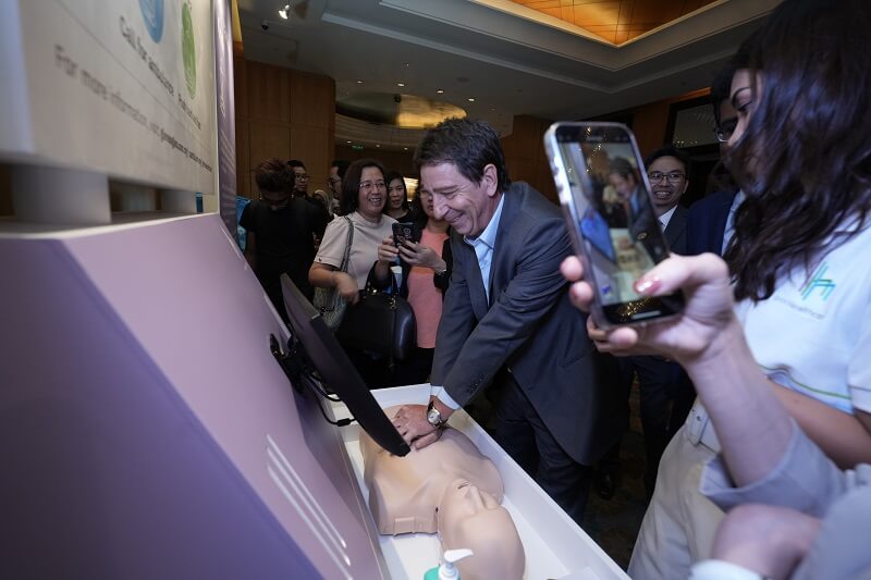 Jean-François Naa, CEO of IHH Healthcare Malaysia, demonstrating the use of the Hands-Only CPR Kiosk that will be placed at strategic locations in Malaysia