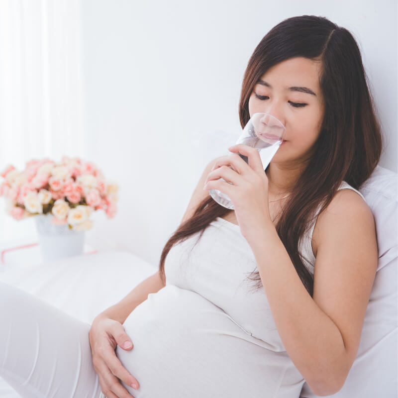 pregnant lady drinking water