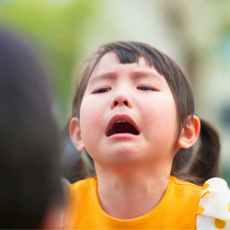 a girl crying forced to be bilingual