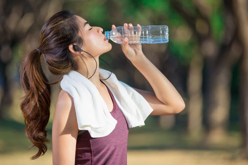 active-woman-drinking-water