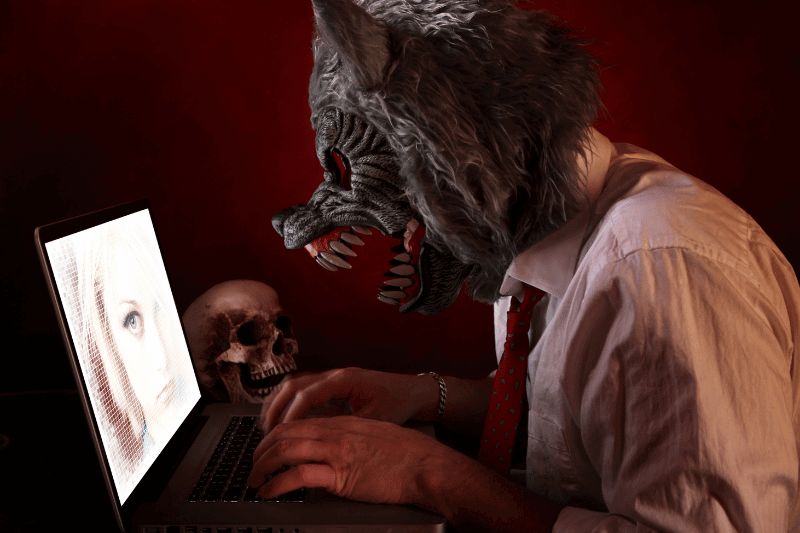 Online Predator wearing Wolf mask (Credit: Canva Pro)