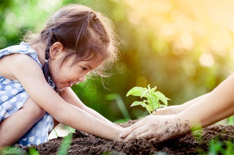 socially-conscious-girl-planting