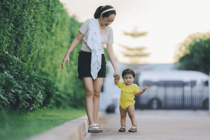 mum walking with child