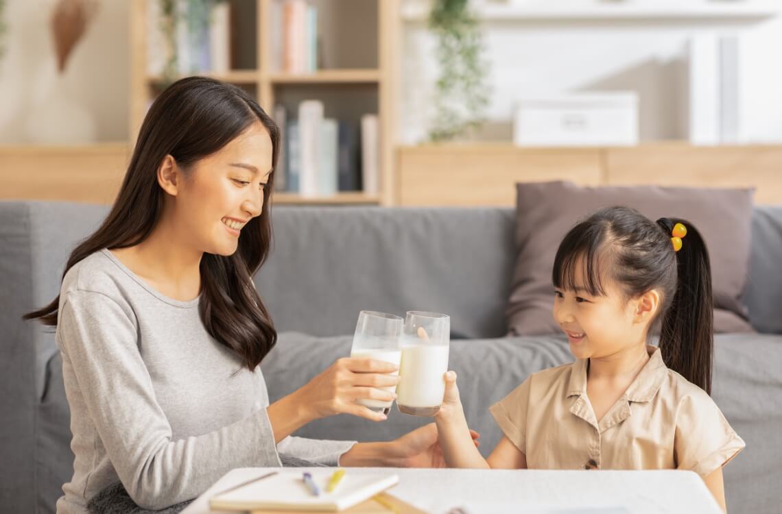 mother and daughter gut health milk