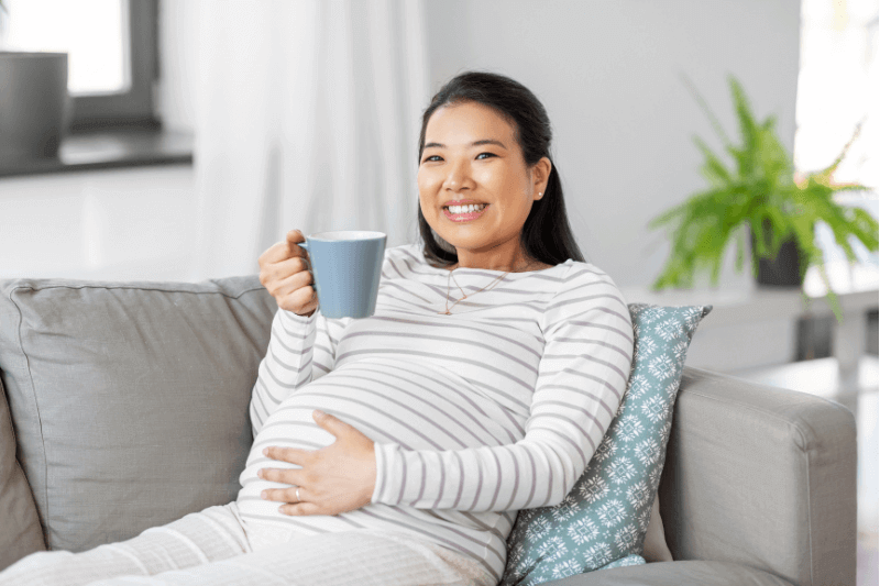 pregnant mum enjoying coffee