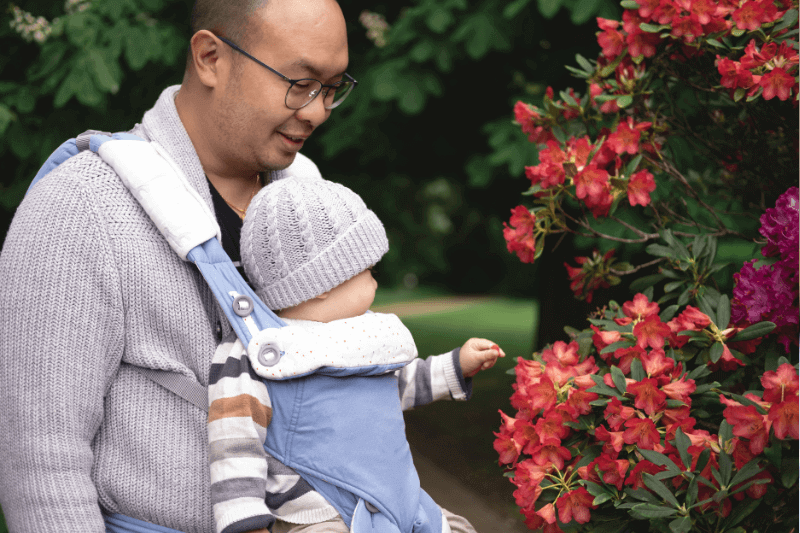 father with baby carrier