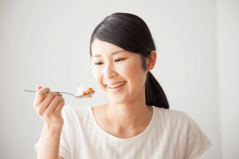 woman eating spicy food