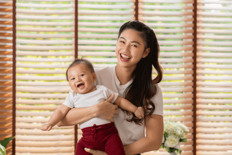 happy baby and mother