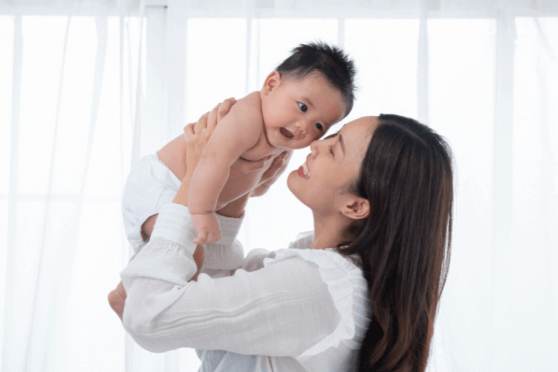 happy mum and baby