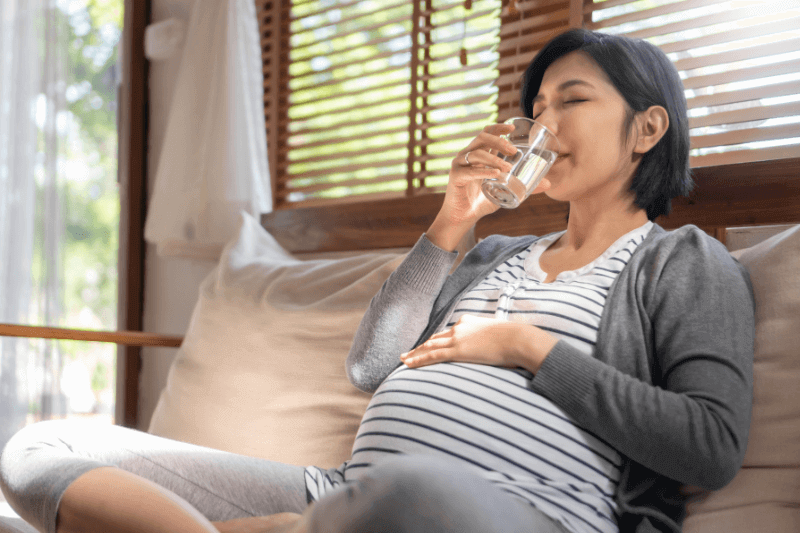 pregnant mum drinking water