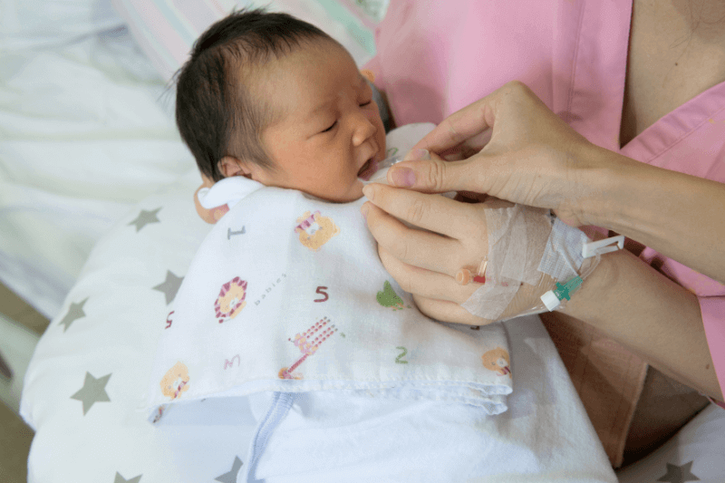 feeding baby colostrum