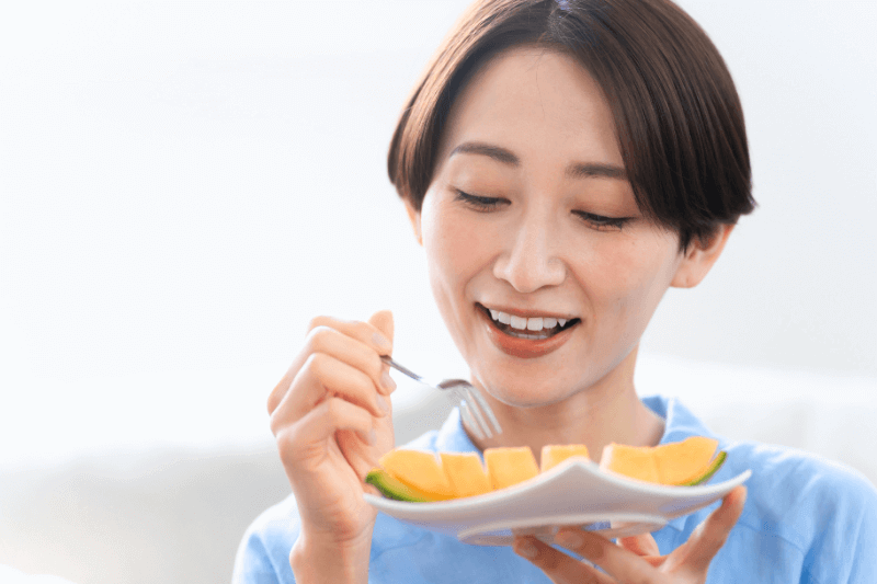 mum enjoying fruits