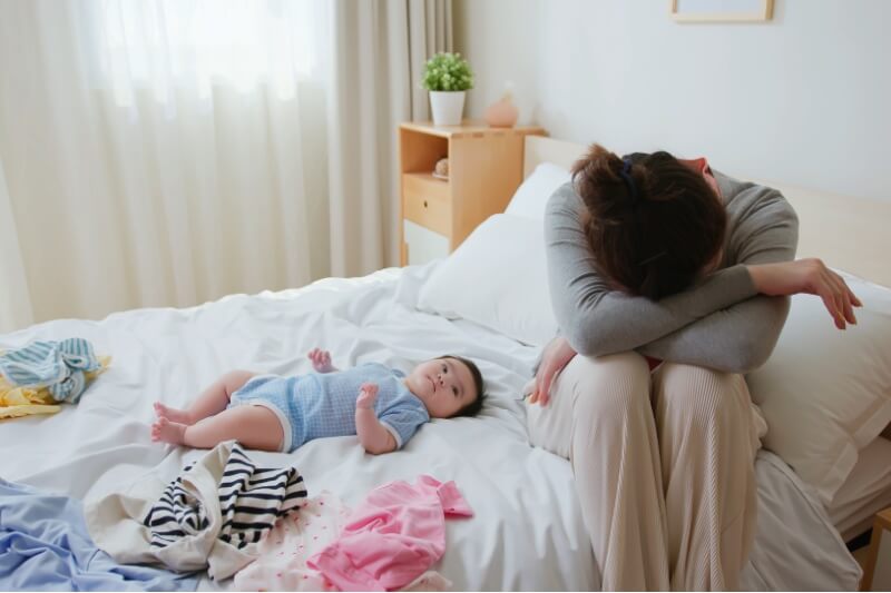 mother tired with newborn