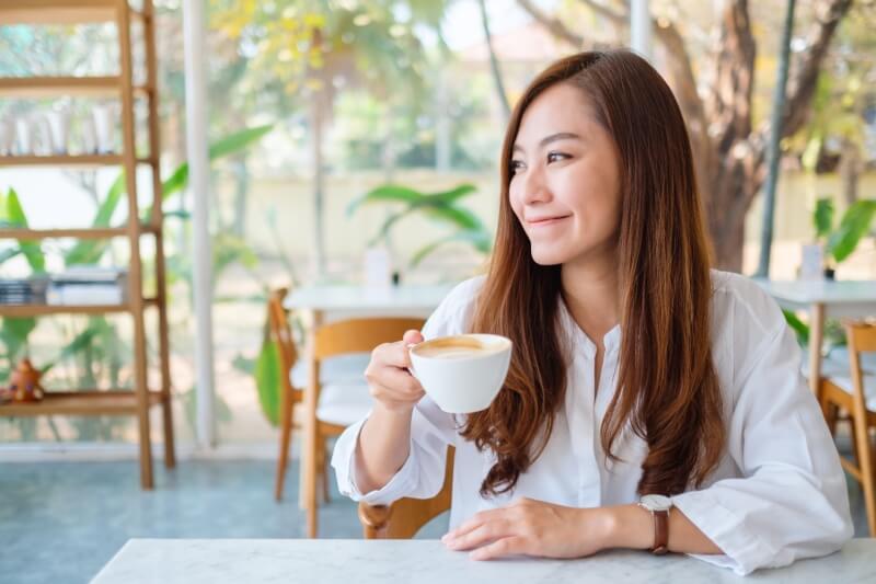 young mother having coffee for mental reset