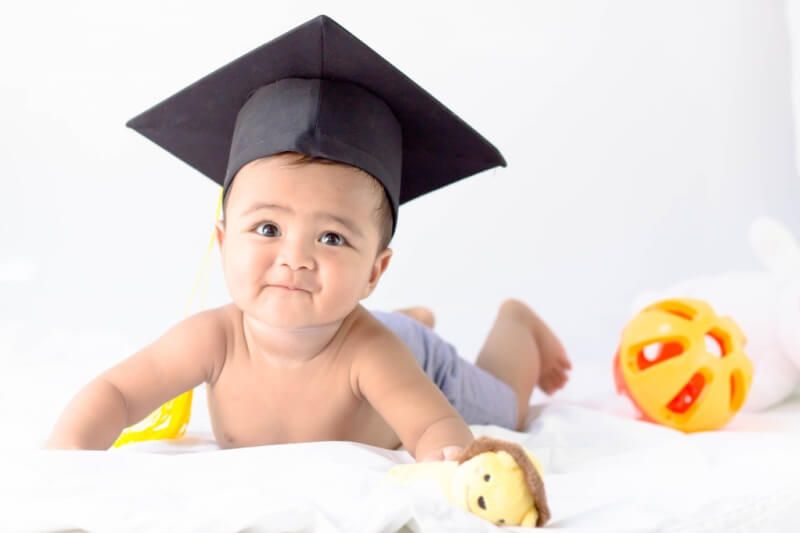 little baby with graduation hat