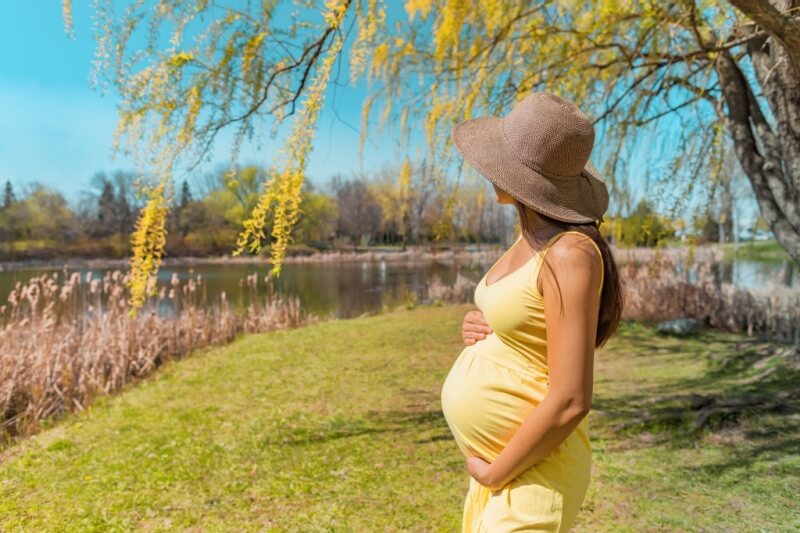 pregnant woman enjoying outdoor time