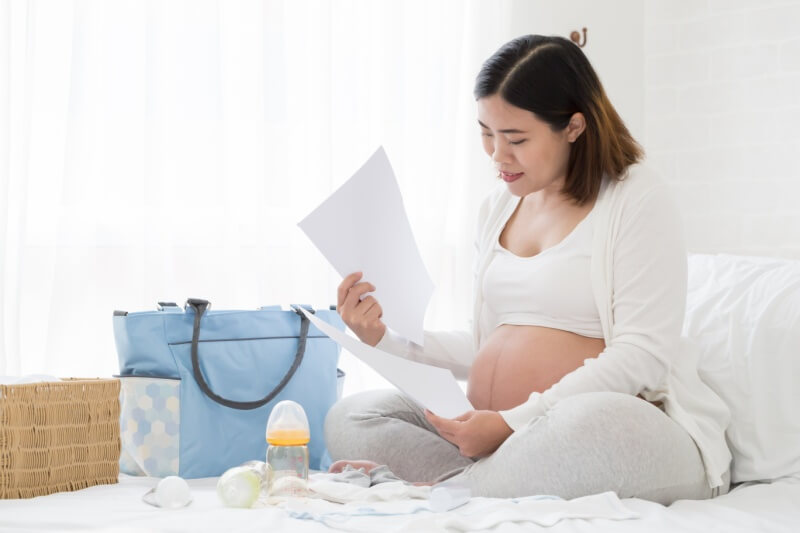 lady preparing hospital bag for labour