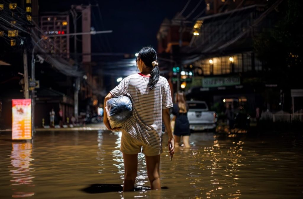 woman bracing through floods