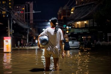 woman bracing through floods