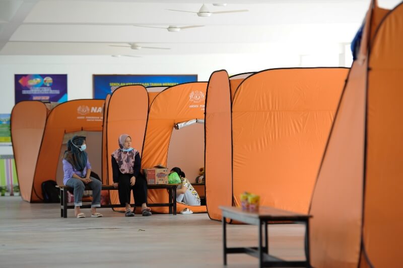 orange tents in flood shelters