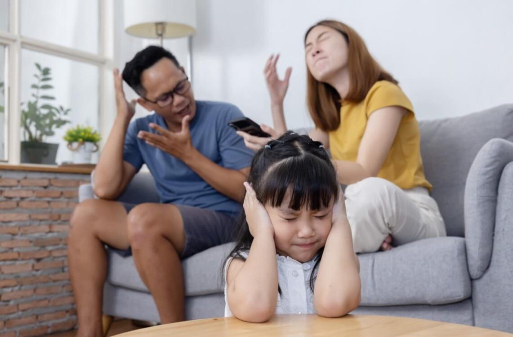 parents arguing in front of children