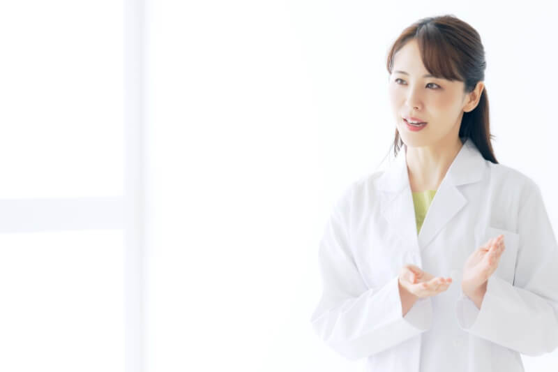 woman in lab coat