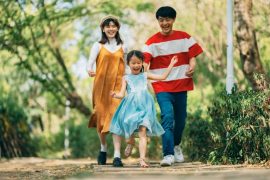 family at the park enjoying outdoor time