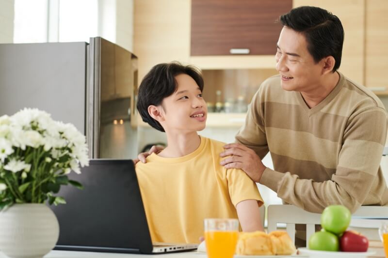 father and son in the kitchen