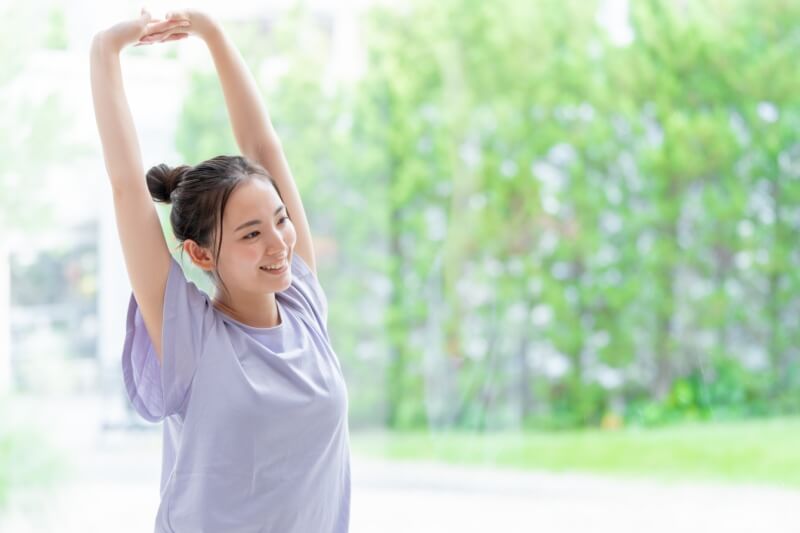 woman doing daily stretches