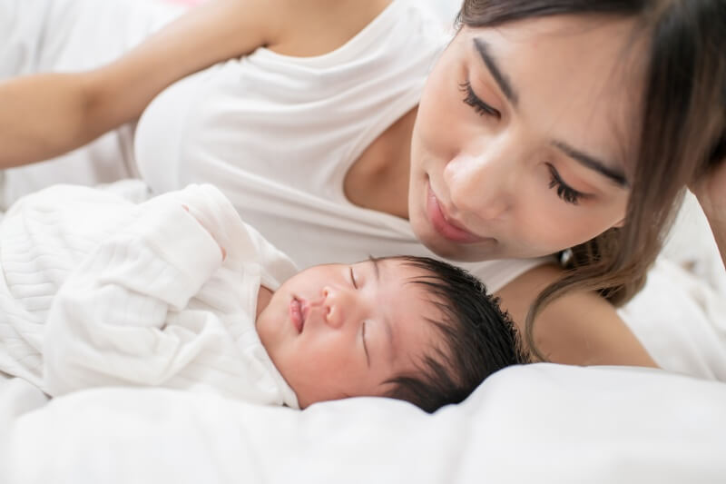 mother and baby resting