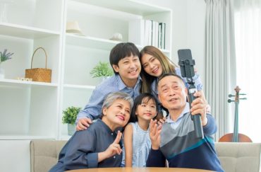 family taking a selfie together