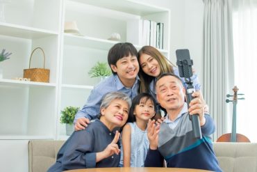 family taking a selfie together