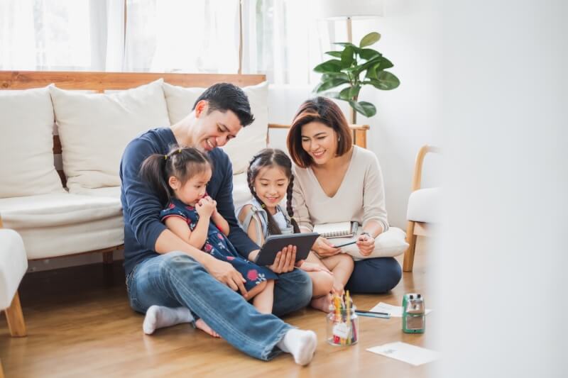 family using ipad