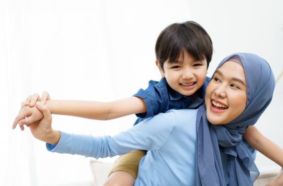 mother and son playing together