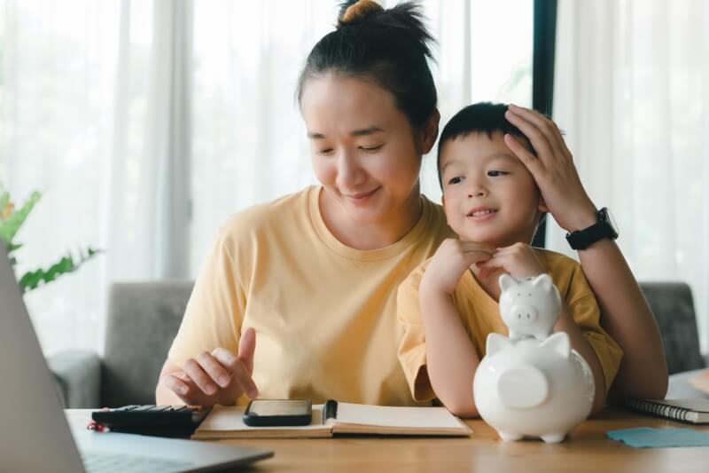 mother and son sitting down and planning their day